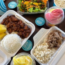 a table of food  and drinks