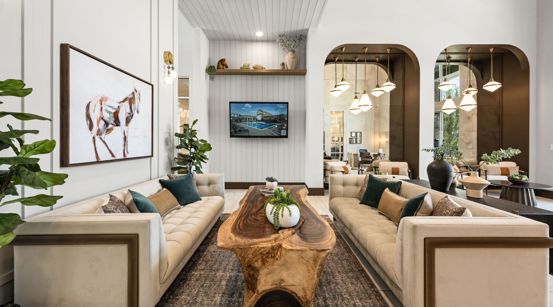 a spacious lounge with plenty of seating options